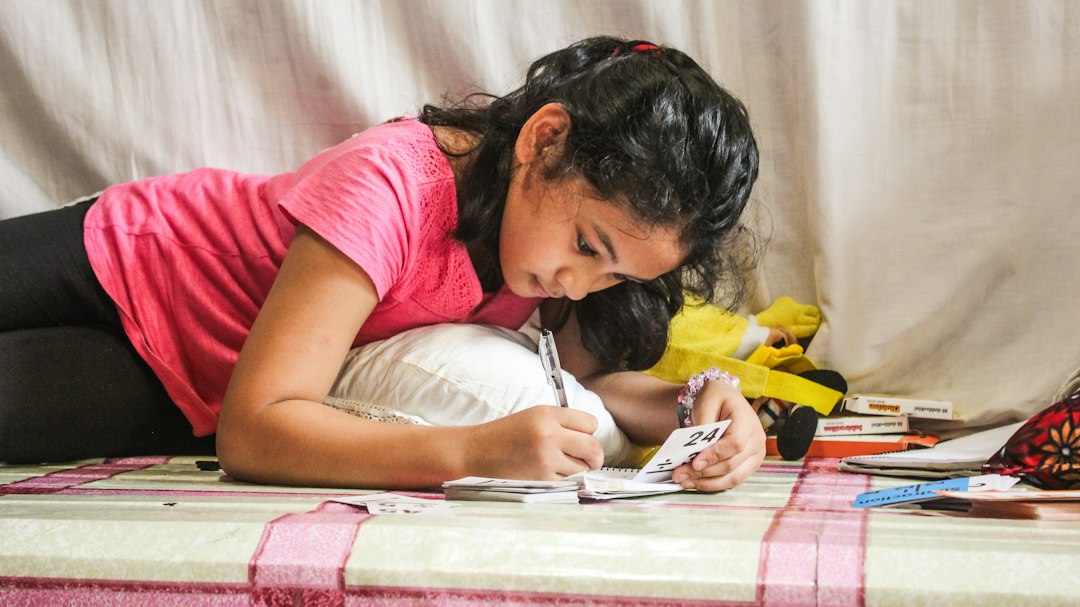 A child eager to learn at school