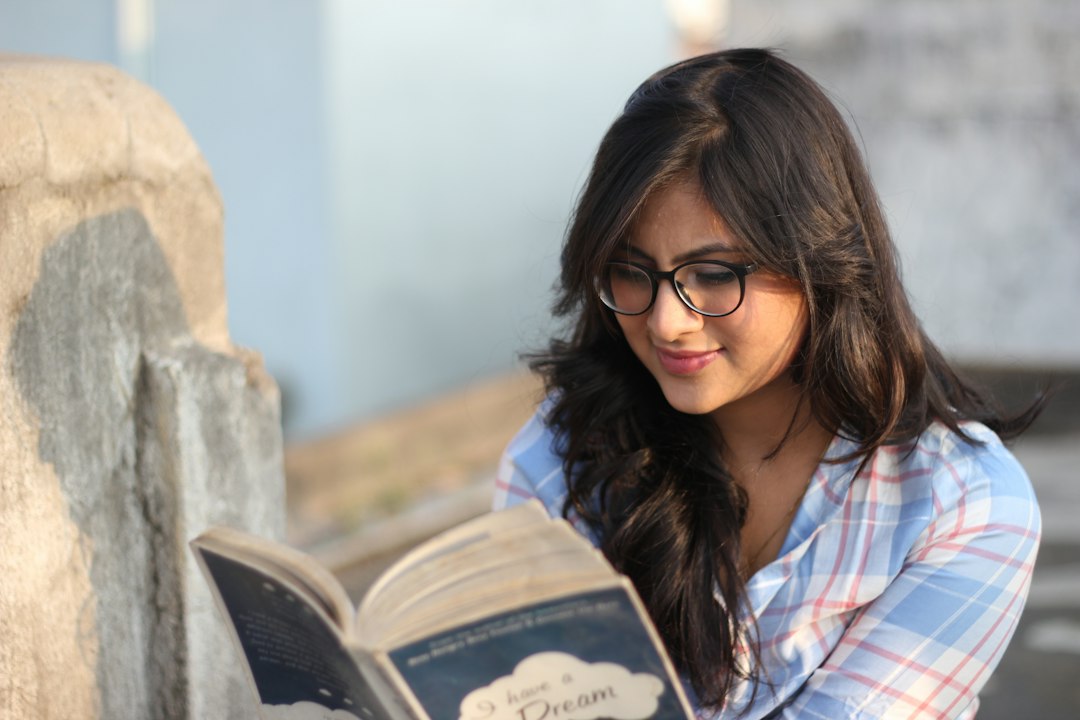 An Indian girl reading a book
