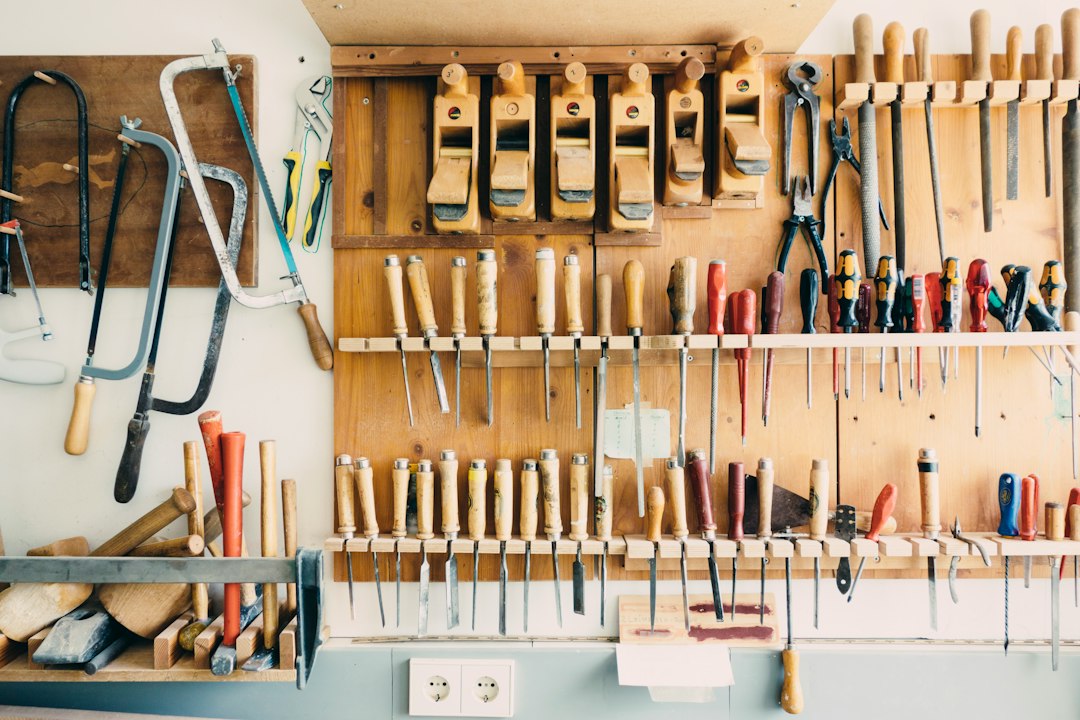 Hand tools on a rack, like those funded by the PM Vishwakarma toolkit incentive
